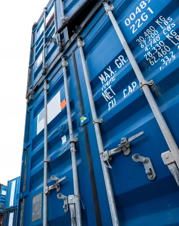 Blue shipping crates stacked up